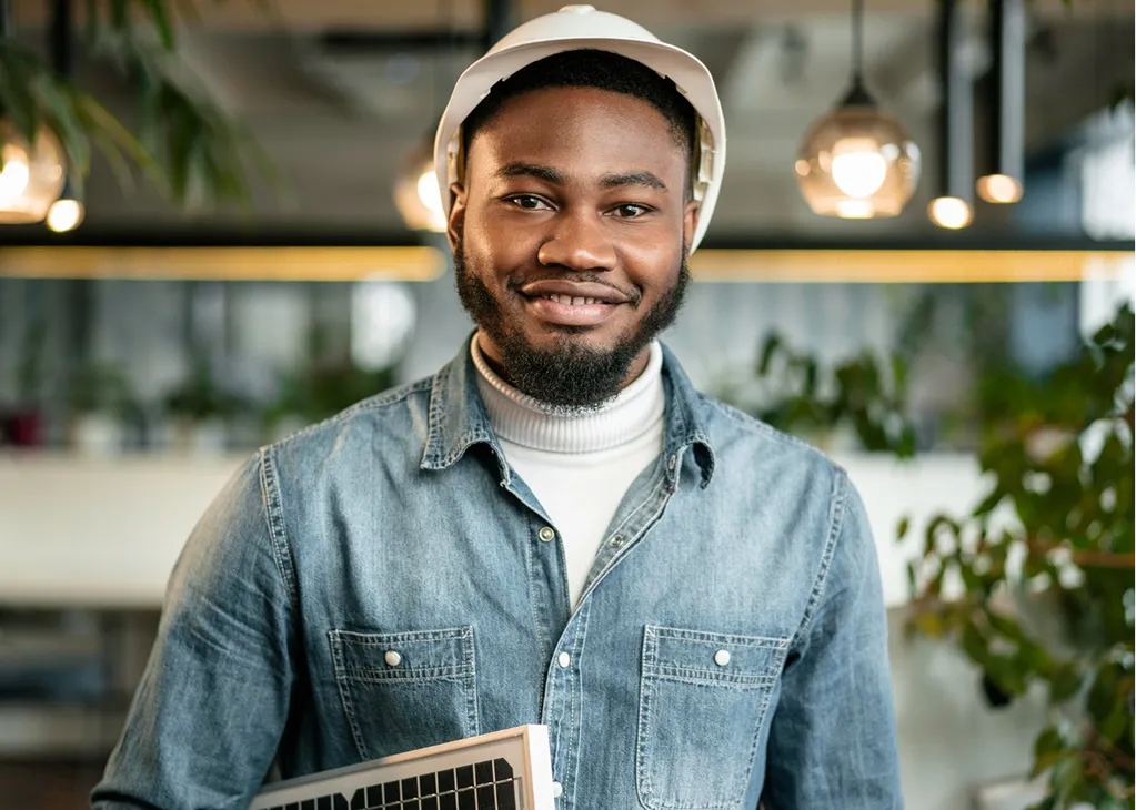 Independent worker sitting outside laughing